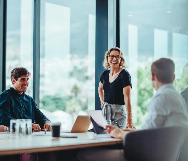 Business team collaborating on financial and advisory services in management consulting.